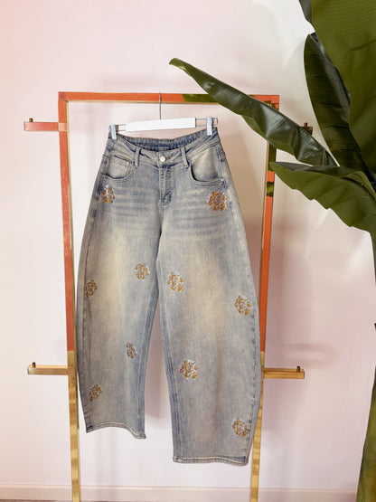 JEANS CON ROSA BRILLANTINI