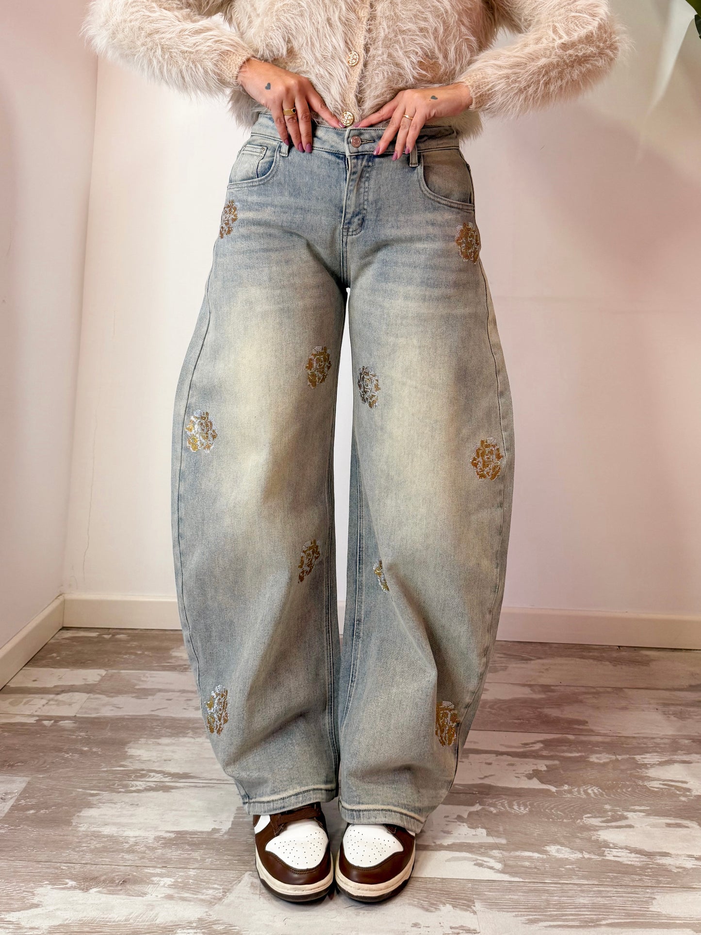 JEANS CON ROSA BRILLANTINI