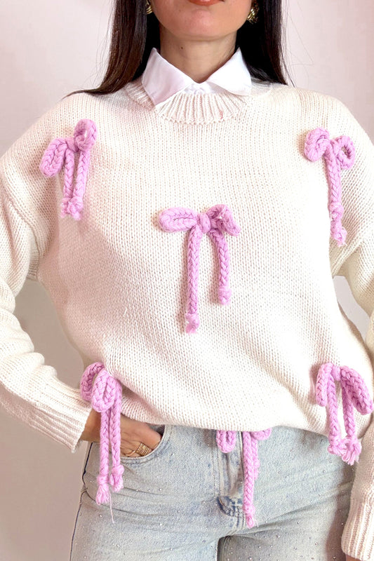 Pull fiocchetti rosa